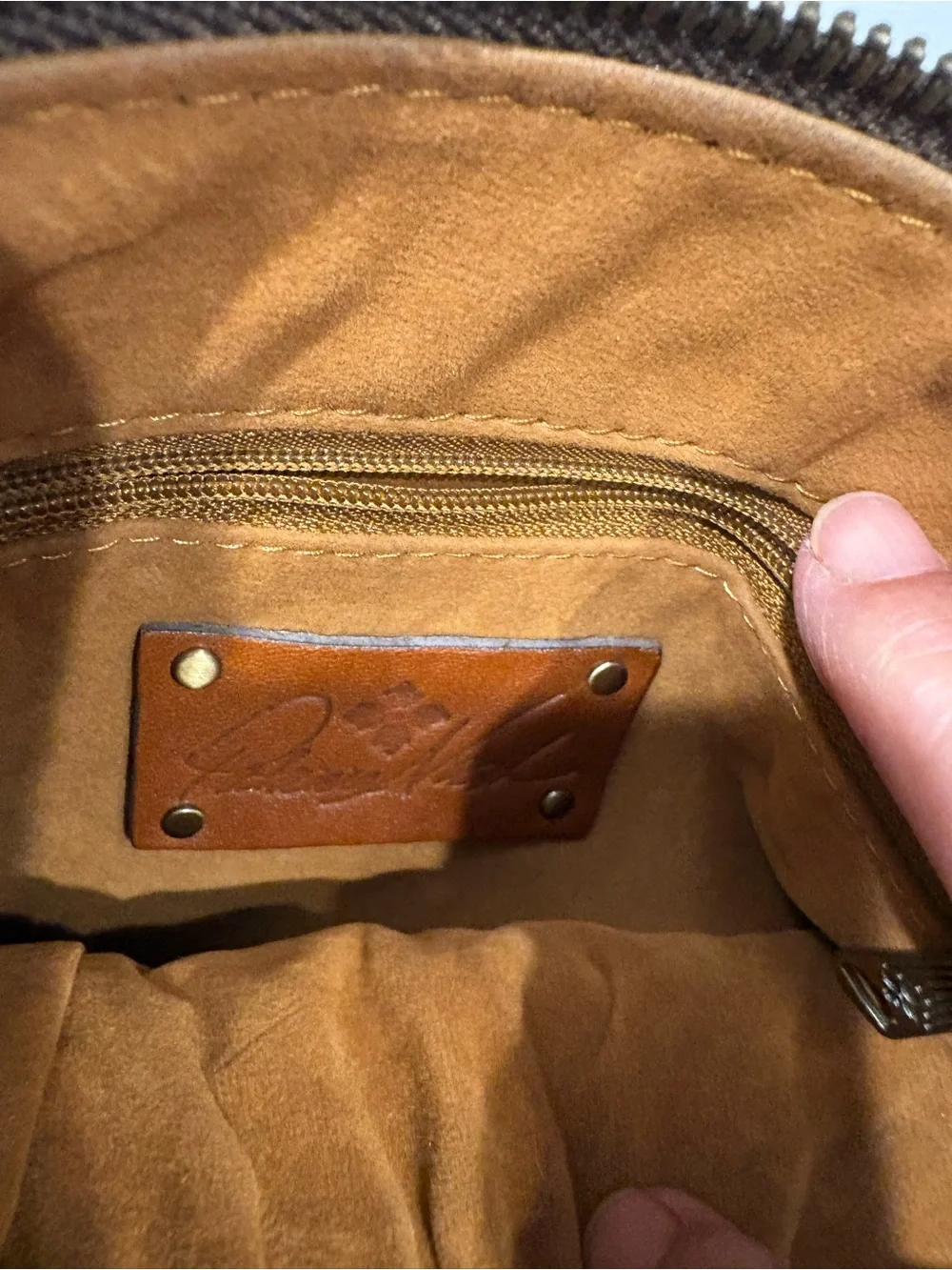 Embossed Leather Wristlet Clutch in Cognac Brown
